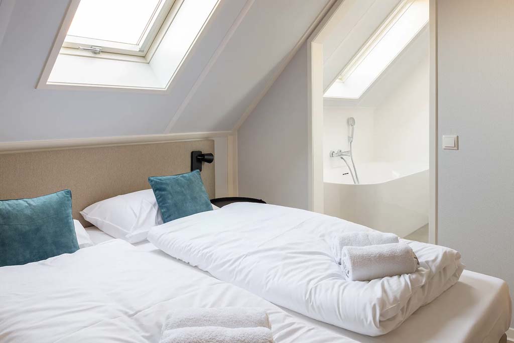 Slaapkamer van Dormio Badhuis Wind Pool