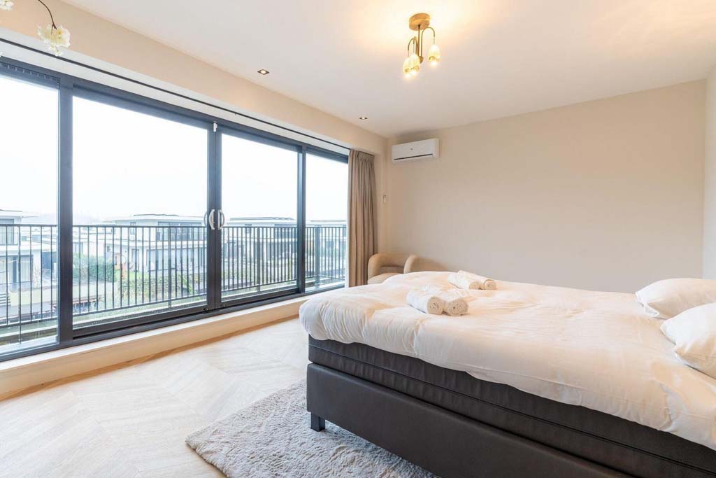 Slaapkamer van de Harderwold Villa Resort