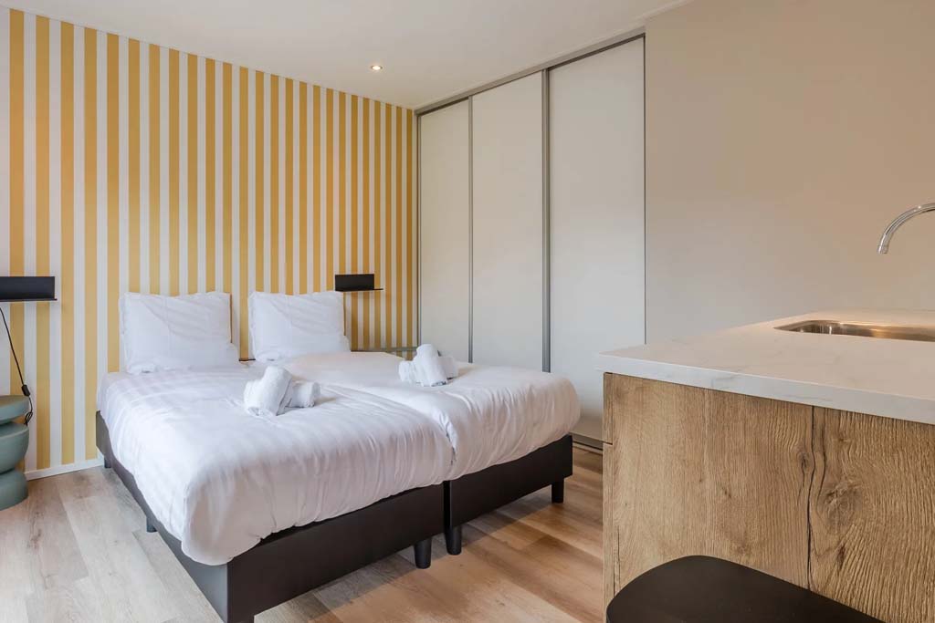 Slaapkamer van de 10-persoons Pool Lodge