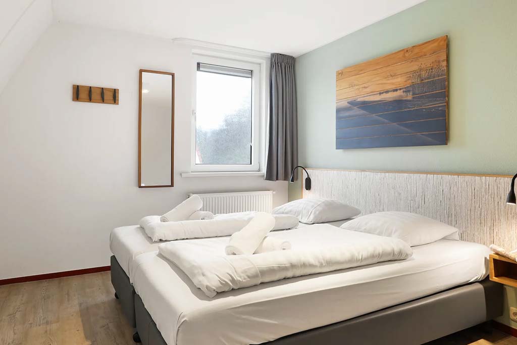 Slaapkamer van de Summio Waterpark De Bloemert Bungalow